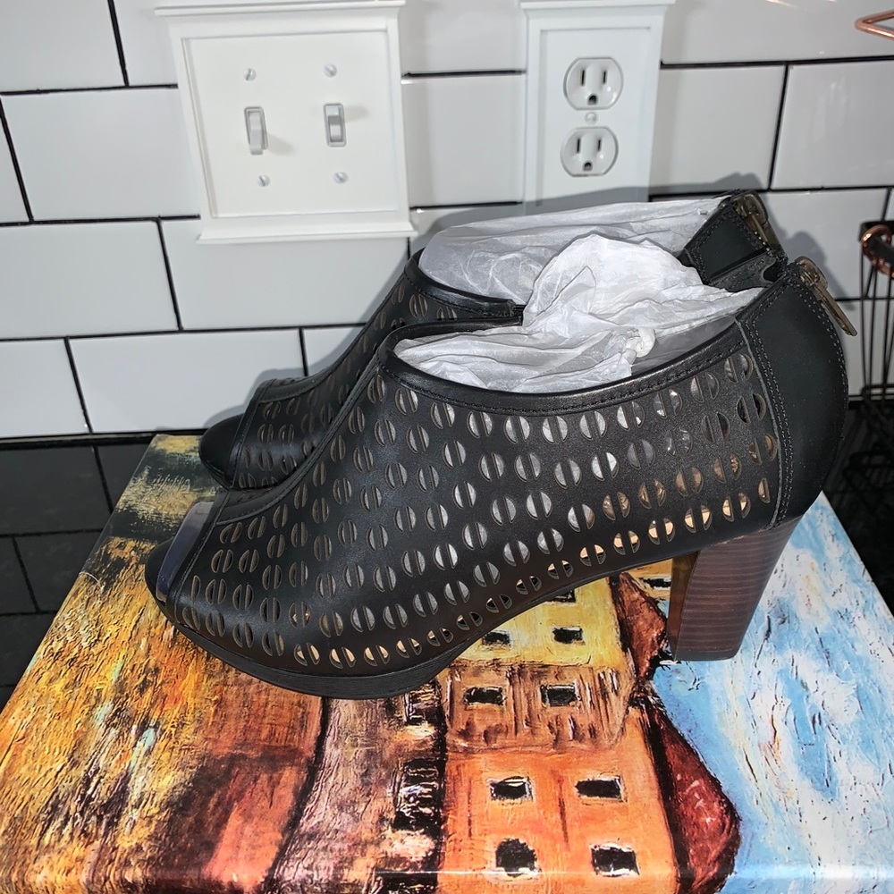 NWT - black leather peep toe heels .